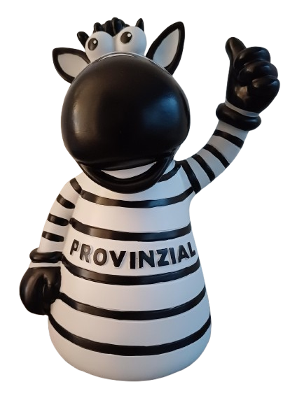 Die Lampe Maskottchen ist eine Zebrafigur aus Polyresin mit schwarzen und weißen Streifen, PROVINZIAL auf der Brust und einem lächelnden Gesicht, das den rechten Huf zum Daumen hoch hebt.