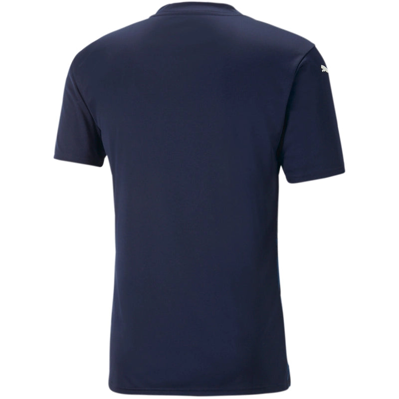 Das teamULTIMATE Jersey Jr PUMA Navy ist ein unifarbenes, marineblaues Kurzarmtrikot mit einem kleinen weißen Logo auf dem linken Ärmel, das von hinten gezeigt wird. Dieses atmungsaktive Oberteil ist perfekt für die Trainingseinheiten der Mannschaft 2024-25.