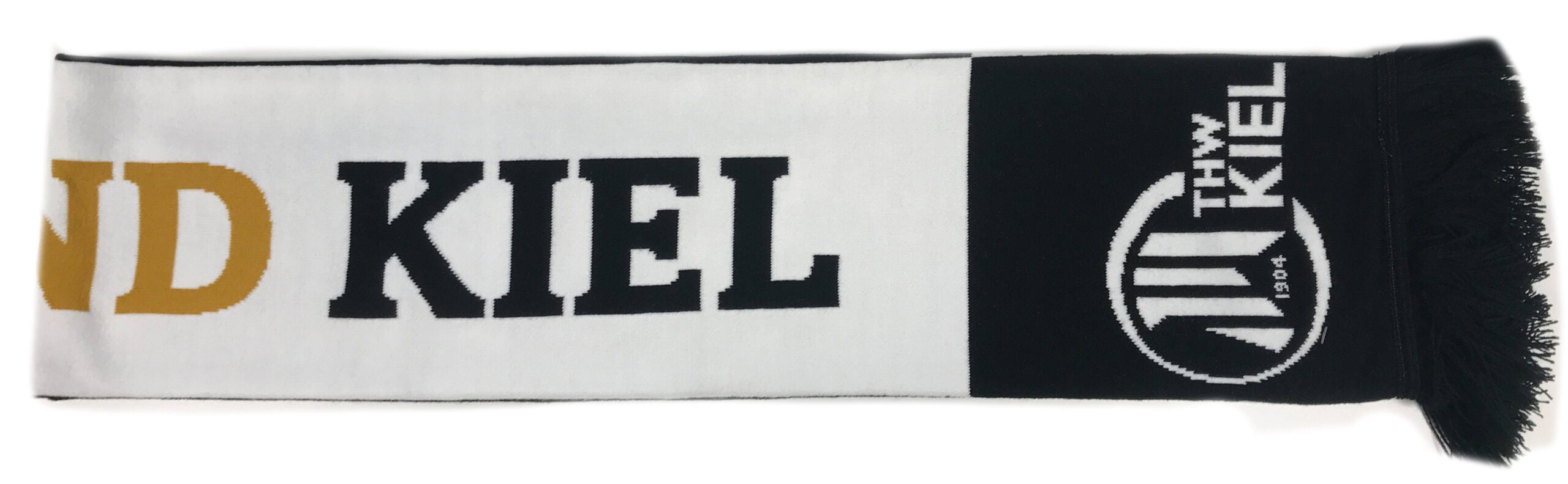 Zeigen Sie Ihre Unterstützung mit dem fein gestrickten "WIR SIND KIEL"-Schal in Schwarz/Weiß/Gold mit THW Kiel-Logo, goldenem Schriftzug und schwarzen Fransen - der perfekte Handball-Fanartikel für jeden Fan.